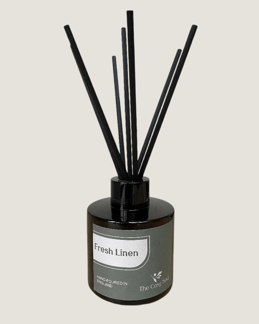 The Cosy Soul Reed Diffuser with black reeds scented as Fresh Linen