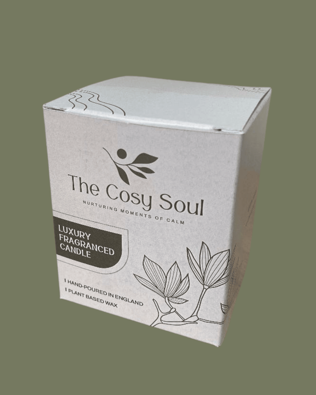 Box of 'The Cosy Soul' luxury fragranced candle on a green background