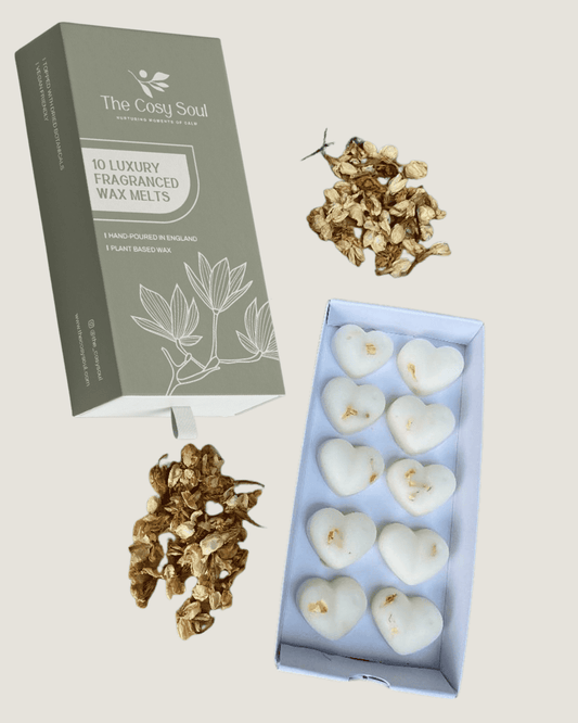 Heart-shaped pear and freesia wax melts with packaging and jasmine dried botanicals