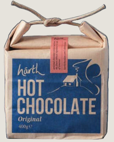 Box of harth hot chocolate with a blue label on a dark background