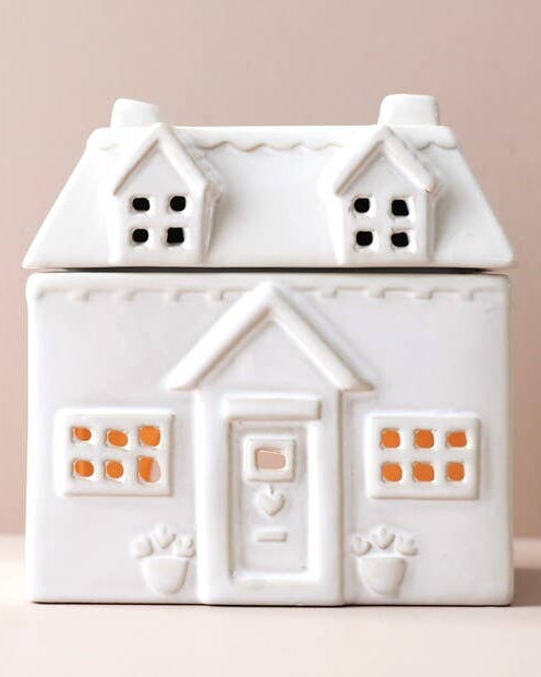 White ceramic house-shaped wax melt burner